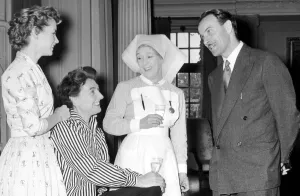 00495 Prints: Birmingham Mail film critic Arthur Steele shares a joke with Muriel Pavlow