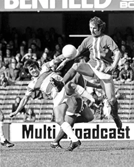 Challenge Prints: Birminghams Bob Hatton (centre) gets to the ball ahead of QPR