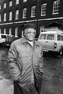 Bishop Prints: Bishop Desmond Tutu arriving at Kings College for a press conference