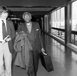 Bishop Prints: Bishop Desmond Tutu en route from South Africa to Vancouver at Heathrow Airport