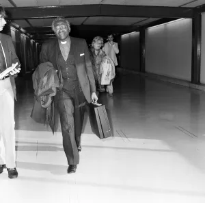 Bishop Desmond Tutu en route from South Africa to Vancouver at Heathrow Airport