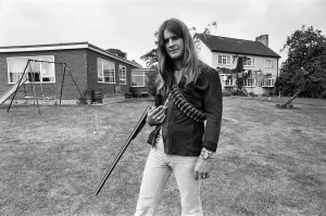 00530 Prints: Black Sabbath lead singer Ozzy Osbourne out with his shotgun at his Staffordshire home