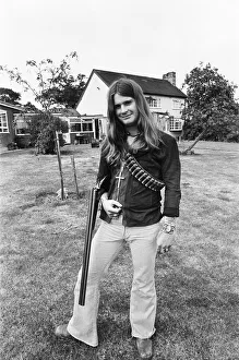 00530 Prints: Black Sabbath lead singer Ozzy Osbourne out with his shotgun at his Staffordshire home