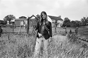00530 Prints: Black Sabbath lead singer Ozzy Osbourne out with his shotgun at his Staffordshire home