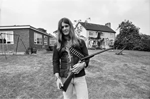 00530 Prints: Black Sabbath lead singer Ozzy Osbourne out with his shotgun at his Staffordshire home