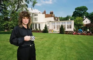 Black Sabbath singer Ozzy Osbourne holding a cup of tea in the garden of his home