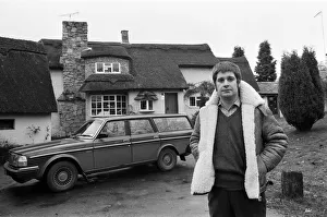 00530 Prints: Black Sabbath singer Ozzy Osbourne pictured outside his new house, beside his Volvo car