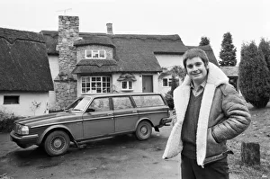 Black Sabbath singer Ozzy Osbourne pictured outside his new house, beside his Volvo car