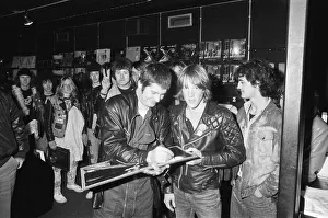 00530 Prints: Former Black Sabbath singer Ozzy Osbourne pictured surrounded by young fans looking for