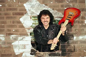Black Sabbaths Tony Iommi helps to demolish a wall at Musical Exchanges in