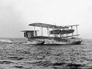 Air Force Prints: A Blackburn Perth aircraft of 209 Squadron seen here taking off from the sea near