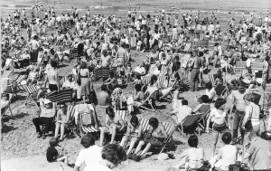 Sun Bathing Prints: Blackpool Beach crowds of people pack the beach on a sunny day August 1981