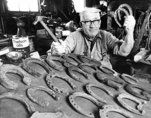00022 Prints: Blacksmith Robert Ormiston of Otterburn making horseshoes