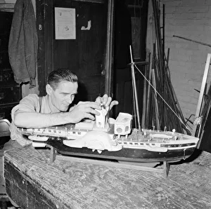 Hobby Prints: A blind model maker completes his latest model boat Circa 1957