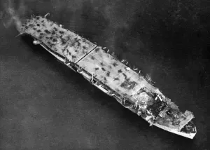 Sinking Prints: Last blows at Japan. Kobe Class escort carrier seen two days after she had been attacked