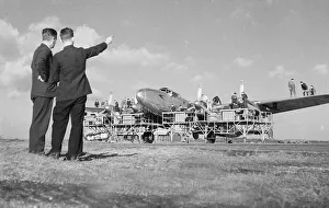 Engineers Prints: BOAC engineers checking the Avro Lancastrian Springbok
