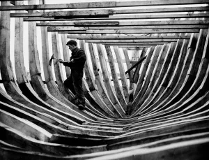 Boat building at Girvan Ayrshire December 1947 Andrew Ollason works with his axe