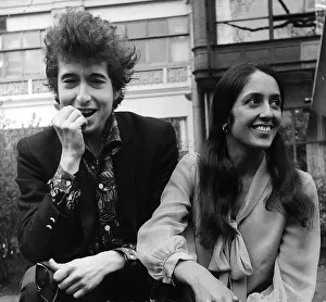 Bob Dylan American folk singer with Joan Baez in the Savoy gardens on the Thames