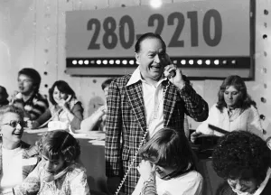 00142 Prints: Bob Hope Actor In Fargo USA Answering CAlls From Viewers On A Phone In Charity Appeal