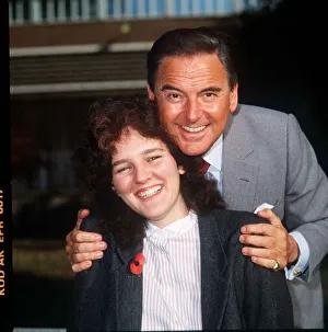 Comedians Prints: Bob Monkhouse Comedian Actor with his adopted daughter Abigail Novemebr