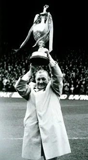00237 Prints: Bob Paisley ex Liverpool manager holding the League Champinship Trophy in 1983