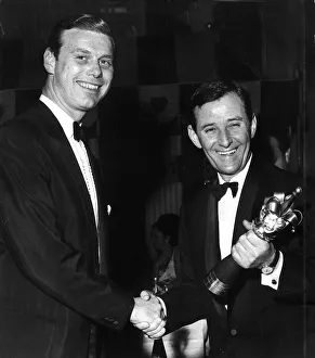 00003 Prints: Bobby Butlin presents Reg Smythe with jester award 1963 during ceremony in London