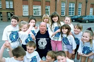 Images Dated 1st January 1992: Bobby Charlton with children from Cavendish First School in Ashington in January 1992