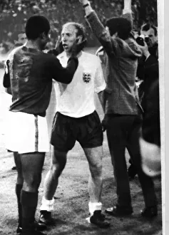 Bobby Charlton of England and Eusebio Portugal after the World Cup Semi Final in 1966