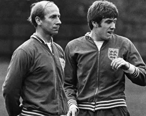 Tracksuit Prints: Bobby Charlton (left) and Emlyn Hughes (right) pictured during an England football