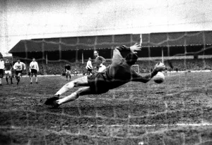 Goal Keeper Prints: Bobby Charlton of Manchester United shoots his penalty kick at goal only to be saved by