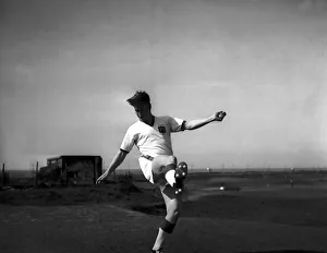 00240 Prints: Bobby Charlton of Manchester United during a training session May 1959