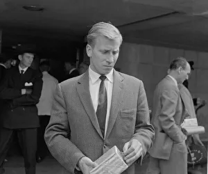 Bobby Charlton pictured upon the England teams return to London after being knocked