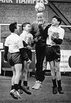 Teaching Prints: Bobby Charlton pictured training with school boys from Bebington High School
