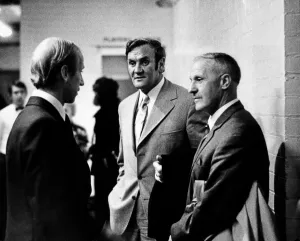 Talking Prints: Bobby Charlton talks with Don Revie (Leeds United manager - centre
