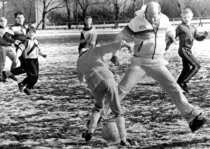 Bobby Charlton with youngsters at Soccer School at Monkton Stadium