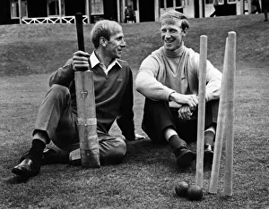 Bobby and Jack Charlton trying their hand at cricket at an England training session