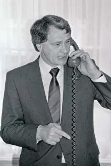 Images Dated 23rd April 1985: Bobby Robson England manager pictured on telephone April 1985