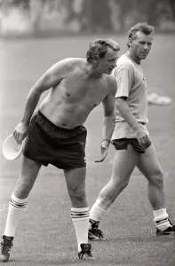 Topless Prints: Bobby Robson England manager seen bare chested on the training ground during 1986 World