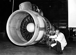 Engineer Prints: A Boeing 707 engine receiving routine maintenance at Gatwick Airport