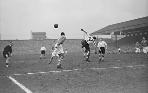 Defender Prints: Bolton Wanderers v Charlton Athletic Division One. The ball is cleared away to safety by