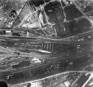Bombs Prints: Bombs from a Bristol Blenheim of No. 2 Group fall over the junction of the main lines