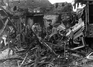 Bombs on Eton college. The boys helping to salvage from the masters house