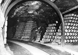Bombs for the RAF are stockpiled in an underground tunnel before being transferred to