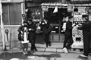 The Boomtown Rats in Tokyo, some of the group members pictured outside a Tokyo shop