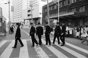 The Boomtown Rats in Tokyo. Pictured walking across a road are the members
