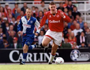 Boro Prints: Boros Jamie Pollock tries an early break against Blackburn Rovers