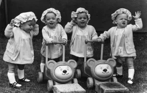 Bonnets Prints: Bouncing quads Claire, Mandy, Nicky and Emma seen here celebrating their first birthday