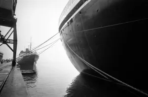 00094 Prints: The bow of the famous ocean liner QE2 tied up at the psenger terminal at Southampton