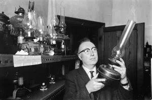 Museums Prints: Bowes Museum Jan 1970 Director Frank Atkinson studies some of the antque items