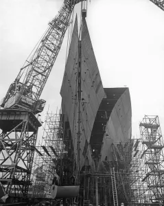 The bows of the the luxury liner Vistafjord are eased into place at the Neptune Yard of